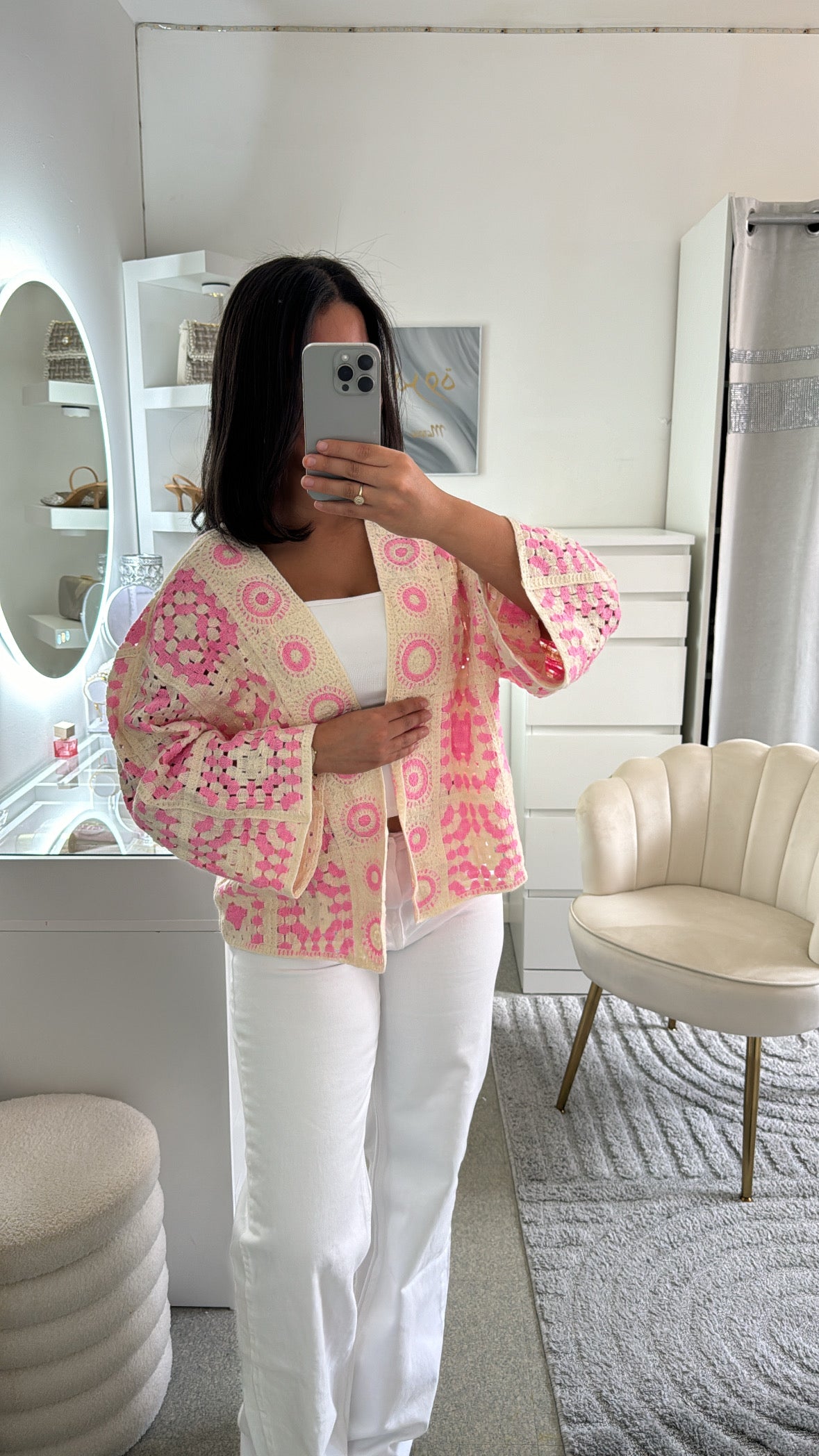 Cardigan en crochet rose