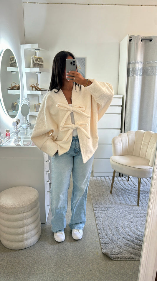 Gros gilet à noeud blanc cassée