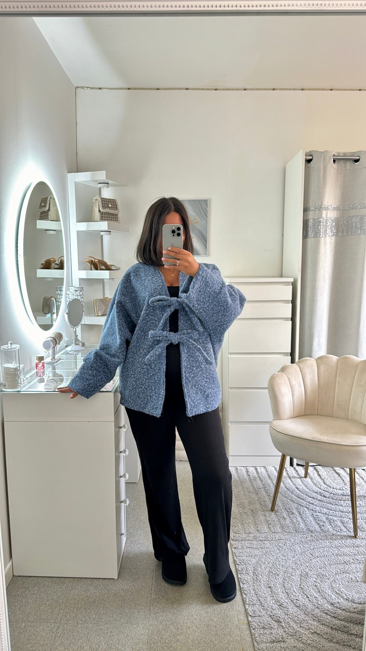 Gros gilet à noeud bleu